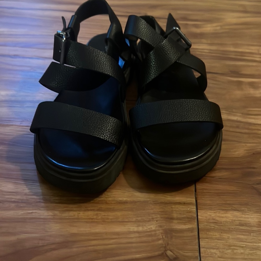 Black sandals by the brand self esteem